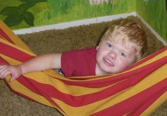The hammock Duane was using didn't offer the safety, high level of movement and sensory stimulation that his new customized bed makes possible.