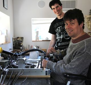 Mike delivers the new vise to Garry, who starts using it immediately.
