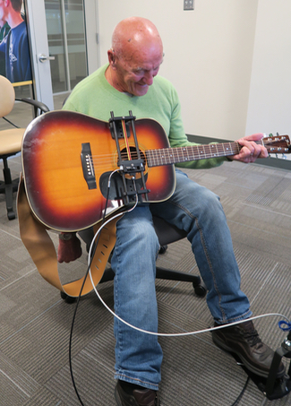 CanAssist Guitar Strummer