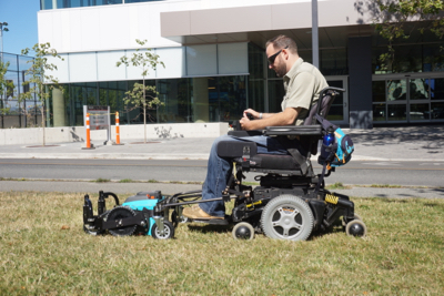 Bill tries out the new mower at UVic.