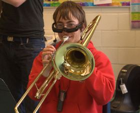 The live image of the conductor is projected onto the lenses embedded into Josh's goggles.